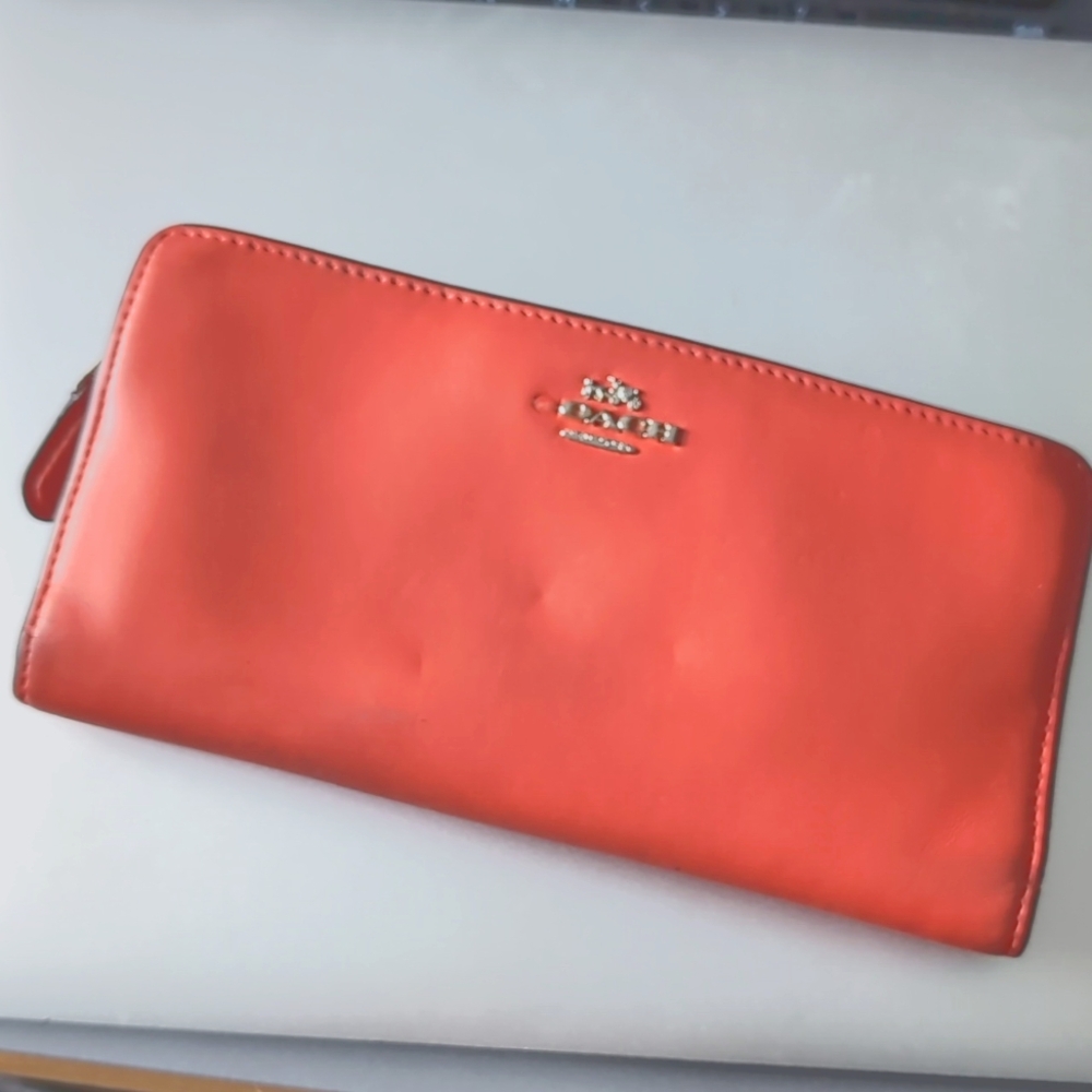 Salmon pink Coach Wristlet